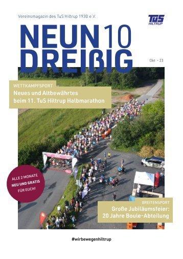 Gruppierung von Läufern beim TuS Hiltrup Halbmarathon auf einer asphaltierten Straße, umgeben von grüner Natur.