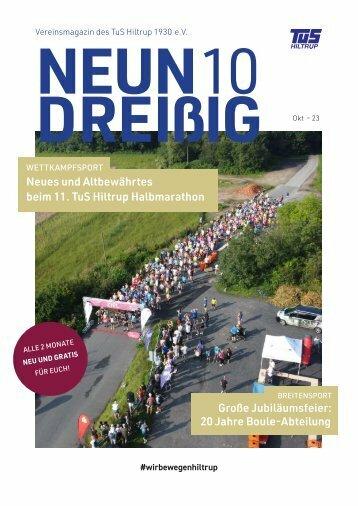 Gruppierung von Läufern beim TuS Hiltrup Halbmarathon auf einer asphaltierten Straße, umgeben von grüner Natur.